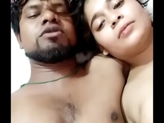 Indian couple talking not far from hindi